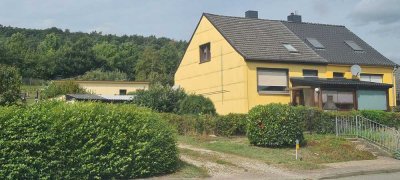 Doppelhaushälfte mit Seeblick und Bootsschuppen am Kummerower See