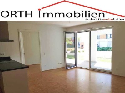 3 Zimmer EG mit Einbauküche, Sonnenterrasse + Zugang zum Gartenbereich.