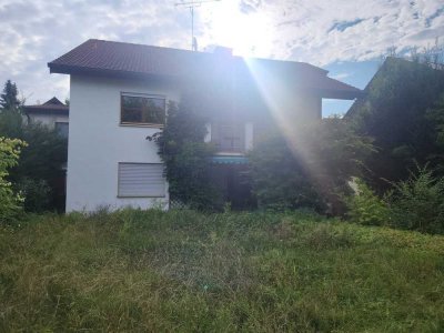 Haus mit tollem Garten zum Wohlfühlen - mit Einliegerwohnung und Potenzial im Dachgeschoss