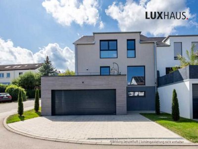 Wohnen mit Weitblick - stilvolles Doppelhaus in Hanglage