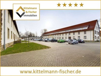 Exklusiv Wohnen im Grünen – 3-Zimmer-Erdgeschosswohnung mit Flair eines eigenen Hauses