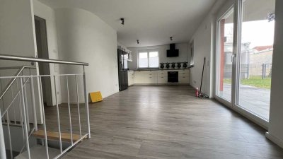 3 Zimmer Erdgeschosswohnung (89qm) mit eigenem Garten