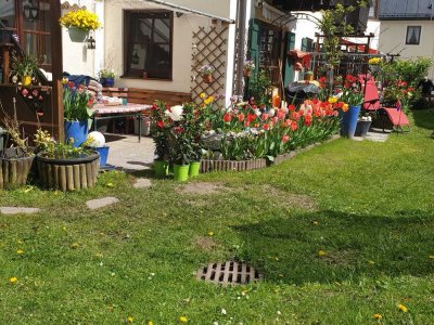 Helle 4-Zimmer-Erdgeschosswohnung mit zwei Terrassen und Gartenanteil in ruhiger Lage