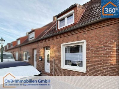 Klein, fein und stadtnah – Reihenmittelhaus mit Terrasse und Nebengebäude