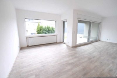 Erstbezug: Ca. 130 m² Wohn- und Nutzfläche im EG und UG mit Garage