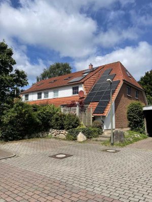 Schönes Wohnen in FL-Tarup – RMH mit tollem Dachgeschossausbau