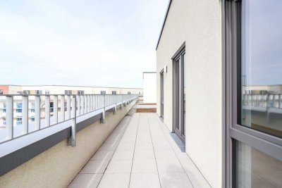 Lichtdurchflutetes Penthouse mit großzügiger Dachterrasse und moderner Einbauküche in Erstbezug!