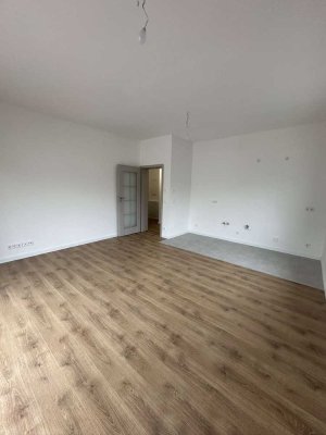 ! Neubau - EG Hochparterre Wohnung mit großzügiger Terrasse !
