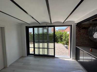 Loftwohnung in historischer Fischräucherei - 5 Zimmer, Westterrasse & Stil in Bestlage Schlutup