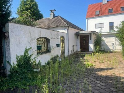 Brück Immobilien - Stark renovierungsbedürftiger Bungalow auf ca. 302?m² Grund