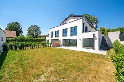 Erstbezug: Großzügiger Familientraum mit unverbaubarem Grünblick!