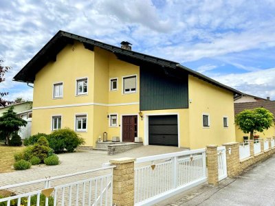 Einzigartiges Zweifamilienhaus mit großem Garten und Doppelgarage!