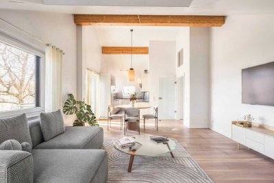 Exklusive DG-Whg in architektonischem Raffinesse mit 4 m hohen Decken