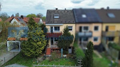 Familienfreundliches Reiheneckhaus mit großem Garten und viel Potenzial in ruhiger Lage