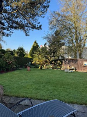 Zeitmietvertrag Helle 3-Zimmer Erdgeschosswohnung mit Wintergarten, Terrasse und Gartennutzung