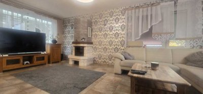 Charmantes Einfamilienhaus mit Kamin, Wintergarten, großer Terrasse und zwei Garagen