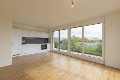 Zwei-Zimmer-Dachgeschoss-Wohnung mit Klimaanlage und zwei Terrassen in ruhiger Einfamilienhausgegend