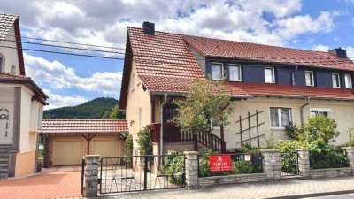 Attraktive Doppelhaushälfte mit 7 Zimmern, Wintergarten, Pool, Keller auf herrlichem Südgrundstück