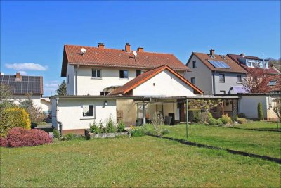 Ein Zuhause für Ihre Familie inmitten der Natur! DHH mit großem Sonnengrundstück in Feldrandlage!