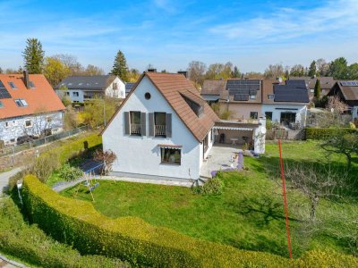 Familientraum in Gröbenzell: Einfamilienhaus auf Eckgrundstück in Top-Lage