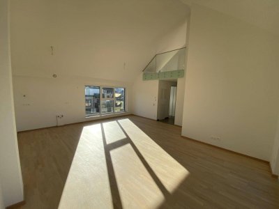 Neu errichtete Maisonettewohnung mit Terrasse und 2 Garagenplätzen - ERSTBEZUG