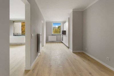 Hochwertig sanierte Wohnung mit Einbauküche, Balkon und Tiefgaragenstellplatz!