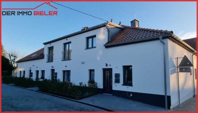Saniertes MFH mit 7 Wohneinheiten, 8 Kfz-Stellplätzen und 1 Garage in Ober-Olm zu verkaufen