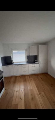 Geschmackvolle, sanierte 2-Zimmer-Erdgeschosswohnung mit geh. Innenausstattung mit Balkon und EBK