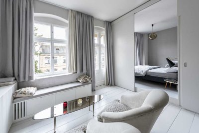 Meticulously refurbished Altbau apartment with New York loft-style flair in vibrant Schillerkiez.