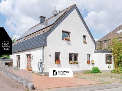 Meerbusch-Bösinghoven: Großzügiges Zwei-Parteienhaus mit ca. 260 qm Wohn- und Nutzfläche