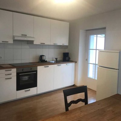 Moderne teilmöblierte 3,5-Zimmer-Wohnung mit einer großzügigen Wohnküche und Dachterrasse