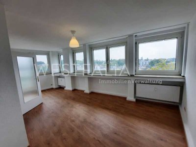 Lichtdurchflutete Wohnung mit Balkon – Wohnen über den Dächern der Stadt