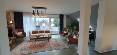Helle Maisonette-Wohnung mit zwei Balkonen und Garage