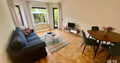 Aufgepasst Expats  - For Expats Neu renovierte , voll mobilierte,moderne Garten Terassen Wohnung
