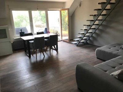 Geschmackvolle, neuwertige 3-Zimmer-Wohnung über 2 Etagen  mit Balkon und EBK in WALLERTHEIM