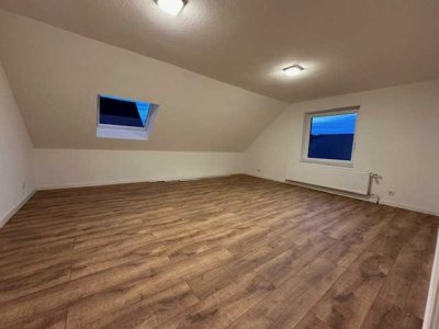 Modernisierte 4-Zimmer Wohnung im DG eines Zweifamilienhauses