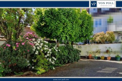 VON POLL - OBERURSEL: Diskretes  Zweifamilienhaus mit idyllischem Innenhof