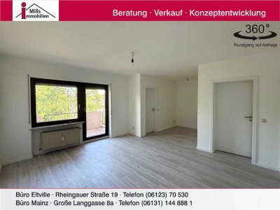 Schöne, renovierte Eigentumswohnung mit zwei Balkonen in zentraler Lage