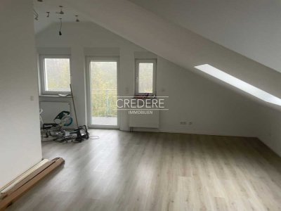 Moderne Dachgeschosswohnung in ruhiger Lage