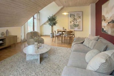 Vermietete Dachgeschosswohnung in ruhiger Lage mit Tiefgaragenstellplatz als Kapitalanlage