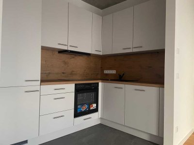 Erstbezug, helle 3 Raum Wohnung, A+ Energie, großer Balkon, geringe NK, Parkett