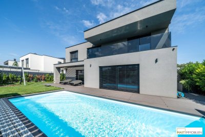 Besonderes Einfamilienhaus mit Pool, Outdoor-Küche &amp; Doppelgarage – vollmöbliert zur Miete in Strasshof an der Nordbahn