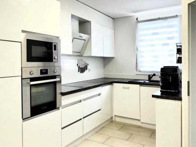 Ruhig gelegene Maisonettewohnung mit überdachter Terrasse und Stellplatz in