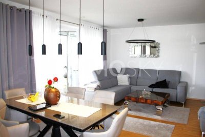 Neuwertiges Raumwunder mit XL Loggia und Tiefgarage