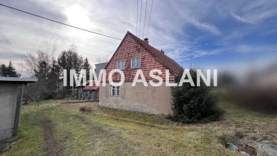 Ausbaufähige Doppelhaushälfte mit Neubaupotenzial – Traumgrundstück mit ca. 1.000 m², Garten+Garage!