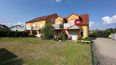 Helle 2-Zimmer-Erdgeschosswohnung mit kleinem Garten und zwei Stellplätzen