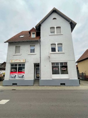 Attraktives 2-Familienhaus mit Gewerbeeinheit und Baupotenzial – Kapitalanlage mit 5,2 % Rendite!
