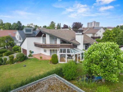 Stilvolles Architektenhaus! Großzügiges Einfamilienhaus mit Einliegerwohnung und traumhaftem Garten