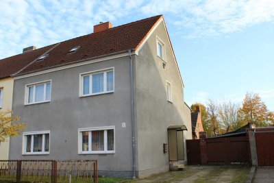 Familienfreundliches Mehrfamilienhaus mit Nebengelass und großem Grundstück