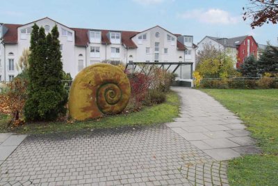 Zentrale Dachgeschosswohnung mit Balkon, Keller und Tiefgaragenstellplatz